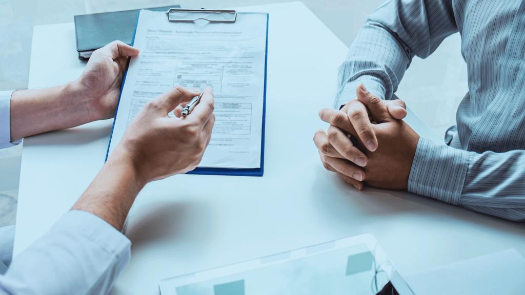 Client consulting with an Alberta personal injury lawyer about an accident claim